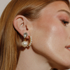 girl wearing hypoallergenic gold pearl bridal hoop earrings and crystal pearl drop bridal statement stud earrings ||all