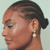 girl wearing hypoallergenic crystal teardrop and pearl pendant bridal statement stud earrings ||all