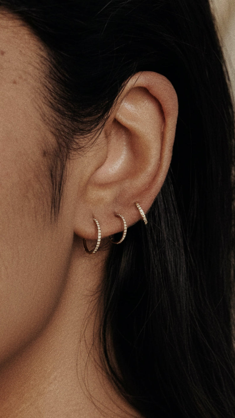 Model wearing Tinilux earrings