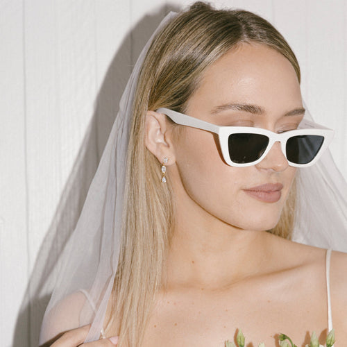 girl wearing hypoallergenic crystal statement earrings ||all